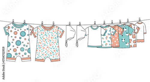 Adorable kids pajamas featuring whimsical prints drying on a clothesline under the sun on a clear day