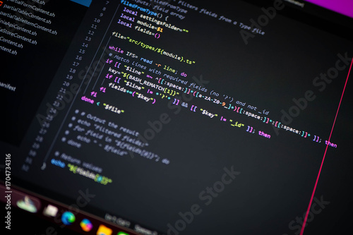 Photography Close-up of colorful Bash shell script code showing fieldsFromType