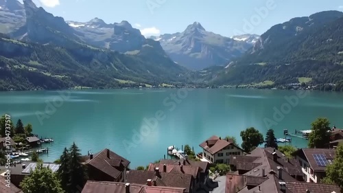 Scenic lake view village with mountain range landscape