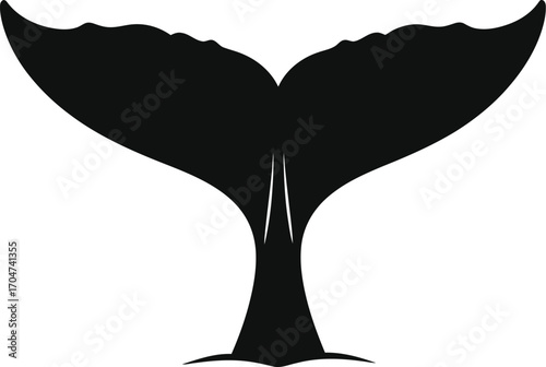 Majestic whale tail silhouette diving into the deep blue ocean water