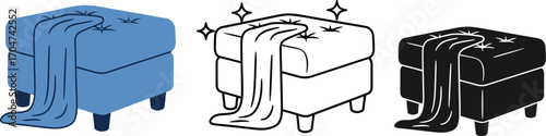Cozy ottoman draped with a soft blanket, perfect for relaxation and home decor