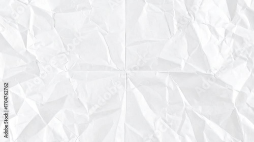 Crumpled white paper with center fold lines