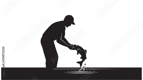 Silhouette of an Angler Releasing a Fish into Water