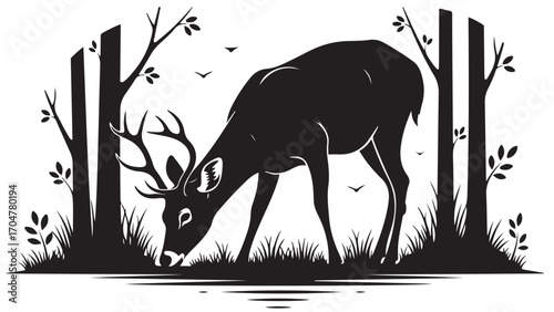 Black Silhouette of a Deer with Antlers Grazing in a Forest by Water