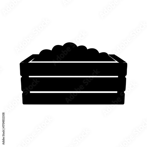 Silhouette of a wooden crate overflowing with lumpy contents and wood planks