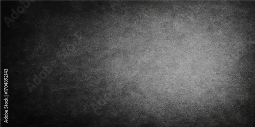 Dark gray grunge metal texture on a textured blank wall with a dirty black pattern and vintage rough surface