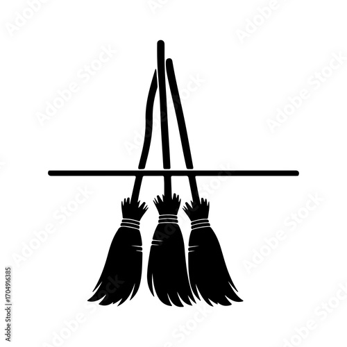 Brooms hanging on a rod with transparent background