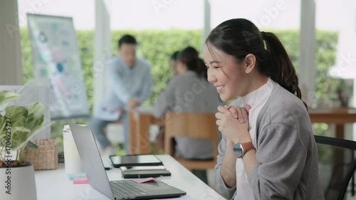 Young adult people asia woman relax smile finish work at office desk receive good news email happy joy bonus pay, win sale award, order test, job hired exam result, loan money banking approve e-mail.