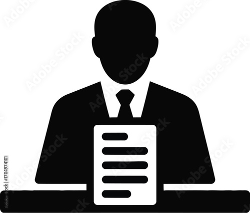 A black silhouette of a person in a suit and tie holding a document with lines on it at a desk icon