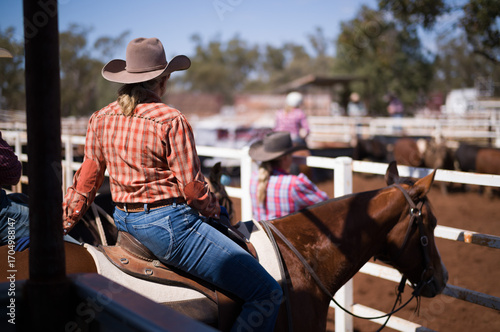 watching Camp draft activities on horse back 