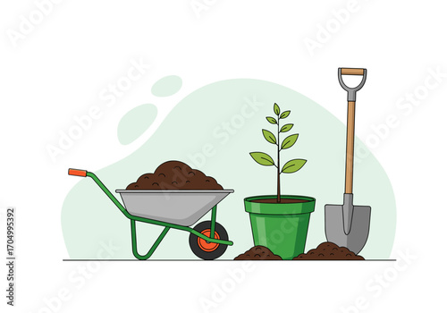 Gardening tools and plant ready for planting in the garden