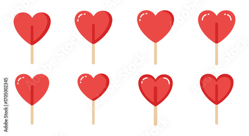 red heart shaped lollipops arranged neatly in rows
