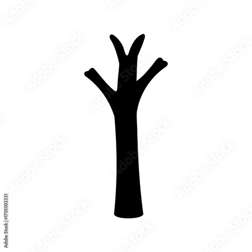 Silhouette of a bare tree with three main branches on a white backdrop