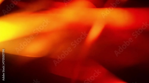 Fiery Abstract: An abstract depiction of vibrant orange and yellow flames dancing against a dark background, creating a sense of intense energy and passion.