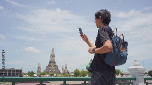 solo travel with asian man chilling see city life in bangkok thailand in summer season
