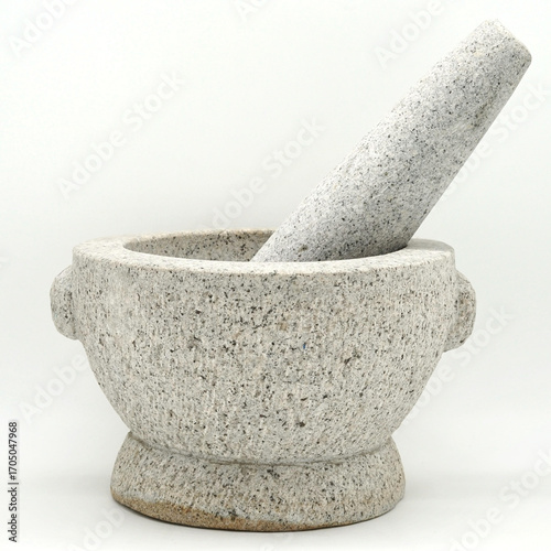 Close-up front view of Angsila a thai traditional granite mortar and pestle photographed from a slightly elevated angle on a plain white background.