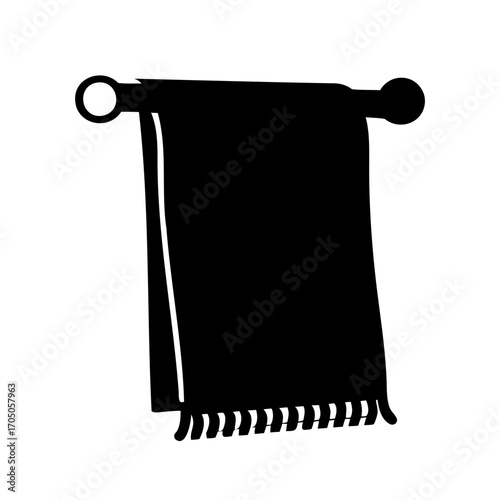 Silhouette of a towel hanging on a towel rack in the bathroom