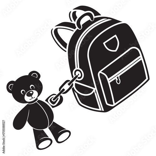 A cute black teddy bear is attached by a chain to a black backpack symbolizing childhood memories and the start of school adventures