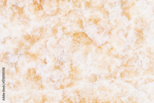 Abstract background from golden marble texture. Luxury backdrop.