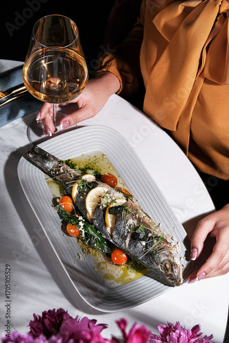Enjoy a refined dining experience with exquisite grilled fish and