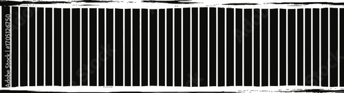 Abstract pattern of vertical black and white lines creating a graphic grid
