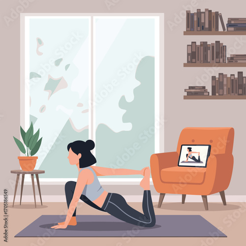 Woman practicing yoga in a cozy living room, following an online class on a tablet. Concept of virtual fitness, wellness, and healthy lifestyle