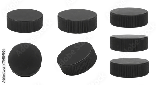 Black Sport Pucks Isolated on White Background in Various Angles