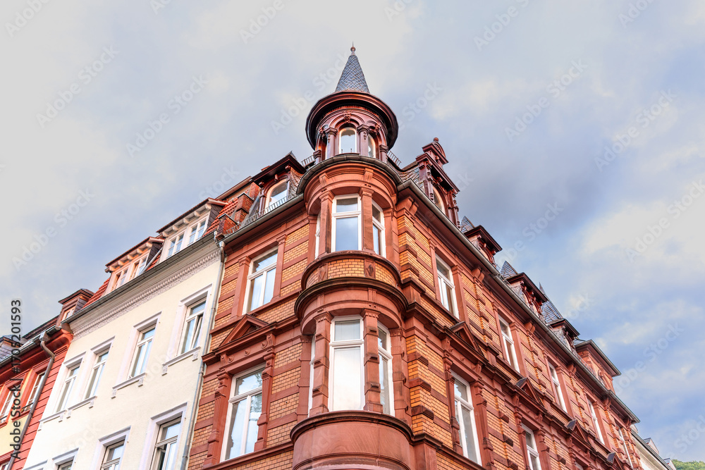 Fototapeta premium Historic Red Brick Building with Turret in Heidelberg Germany