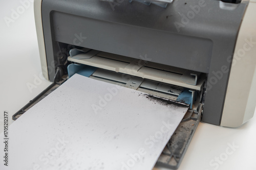 Broken laser printer cartridge on white background. 