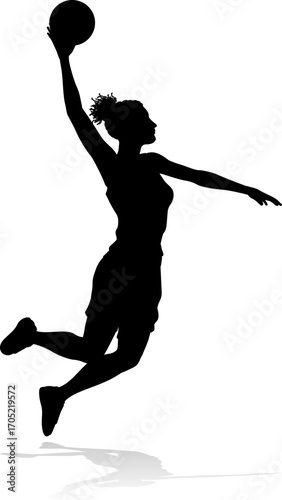 Silhouette of athletic woman female basketball player with basketball ball. Sports concept.