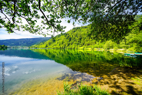 View of Lake Afritz and the surrounding landscape. Nature near Feld am See in Carinthia.
