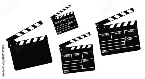 Four clapperboards in a dynamic silhouette arrangement