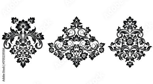 Three ornate damask floral design elements silhouette