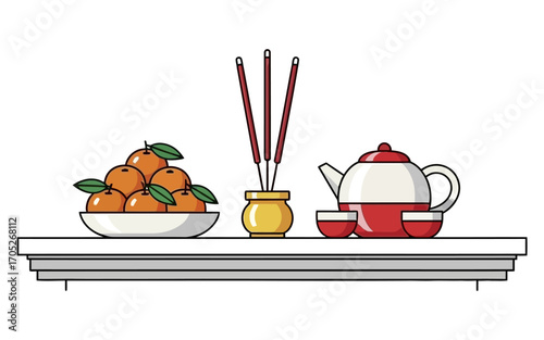 Colorful Offering of Oranges Incense and Teapot for a Ceremony.