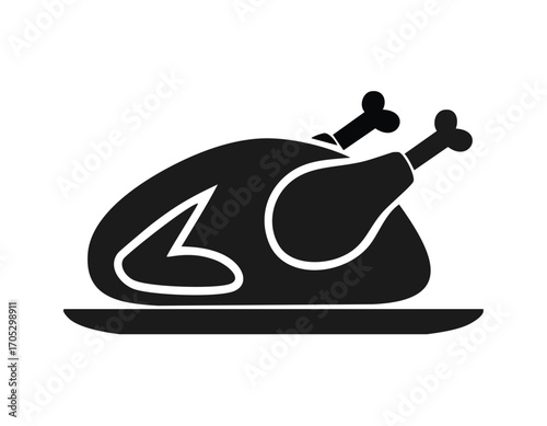 Black silhouette of a cooked turkey on a serving dish Keywords: turkey, roasted, food, meal