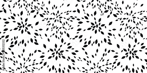 Abstract pattern of black organic shapes resembling leaves or seeds on white background
