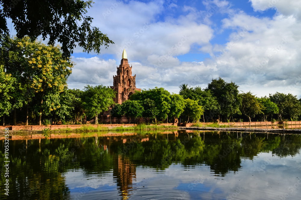 Naklejka premium Old Terracotta Pagoda Lanna Architecture, Symbols of Buddhism, South East Asia at The Terracotta Architecture Garden Lamphun, Northern Thailand.