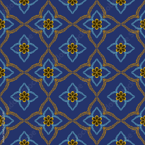 A blue floral-inspired pattern with golden accents, featuring repeated four-petal motifs framed by decorative elements.
