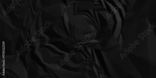 Black crumpled paper texture . Black wrinkled paper texture. Black crumpled and top view textures can be used for background of text or any contents .	
