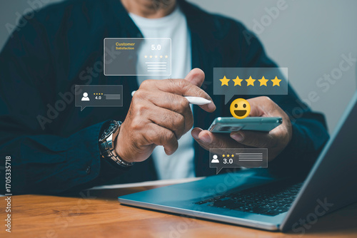 Businessman using smartphone and stylus for online customer feedback, rating review, and satisfaction survey with digital star ranking, modern technology and service evaluation concept.