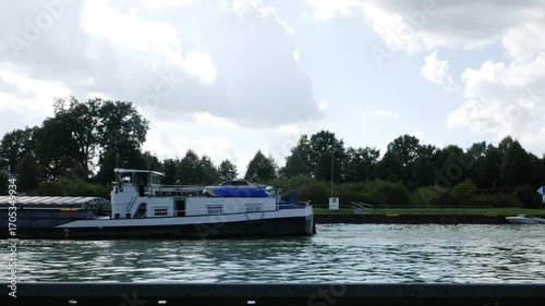 A barge on a water canal near the city of Herstel in Germany