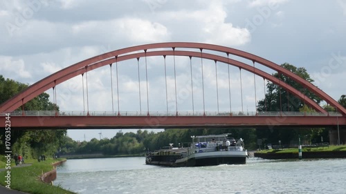 A barge on a water canal near the city of Herstel in Germany