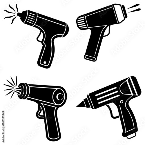 Four black and white glue guns in different styles and orientations on a white background design element