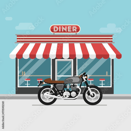 Vintage motorcycle parked outside a classic American diner facade