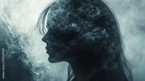 A silhouette of a woman's face is partially obscured by swirling smoke, creating a mysterious and ethereal atmosphere.