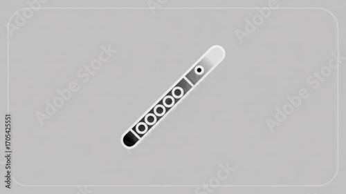 Flute musical instrument on a gray background, showcasing its simple design and elegant form for music enthusiasts and educational purposes