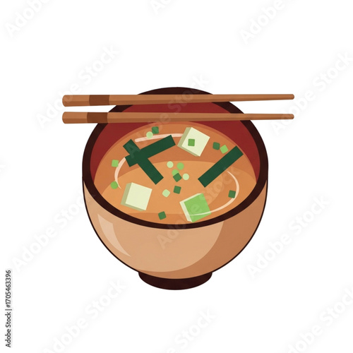 Miso soup with tofu and seaweed in a bowl with chopsticks.