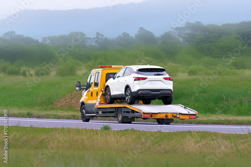 Wallpaper Mural Roadside rescue for disabled white car Torontodigital.ca