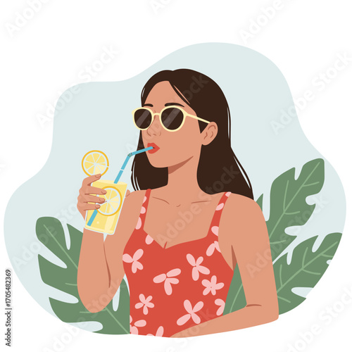 Young woman drinking lemonade in summer outfit with tropical background  