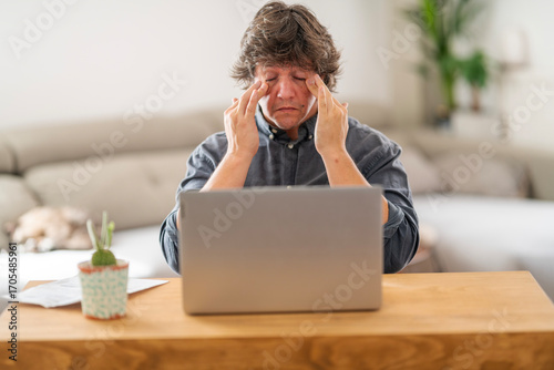 Man with Itchy Eyes from Screen Time at Home